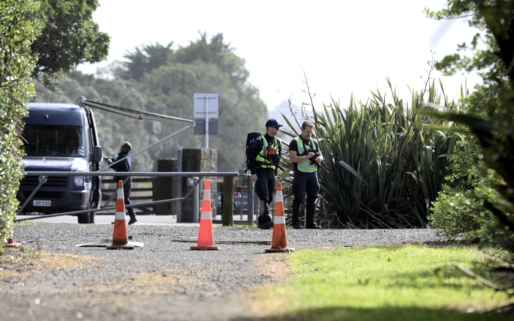 Police at Puketutu Island as a search is underway for a person missing from a boat in Auckland's Manukau Harbour.