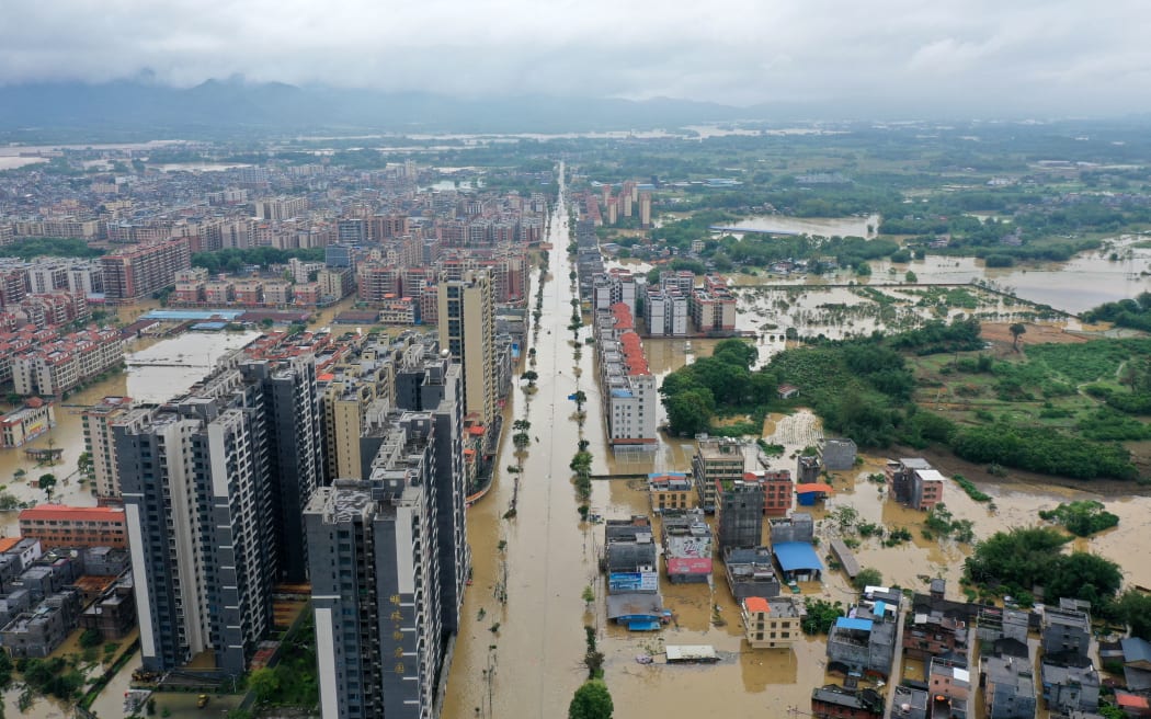 An aerial drone photo taken on 21 April, 2024, shows a submerged area in Hanguang Town of Qingyuan, south China's Guangdong Province.
