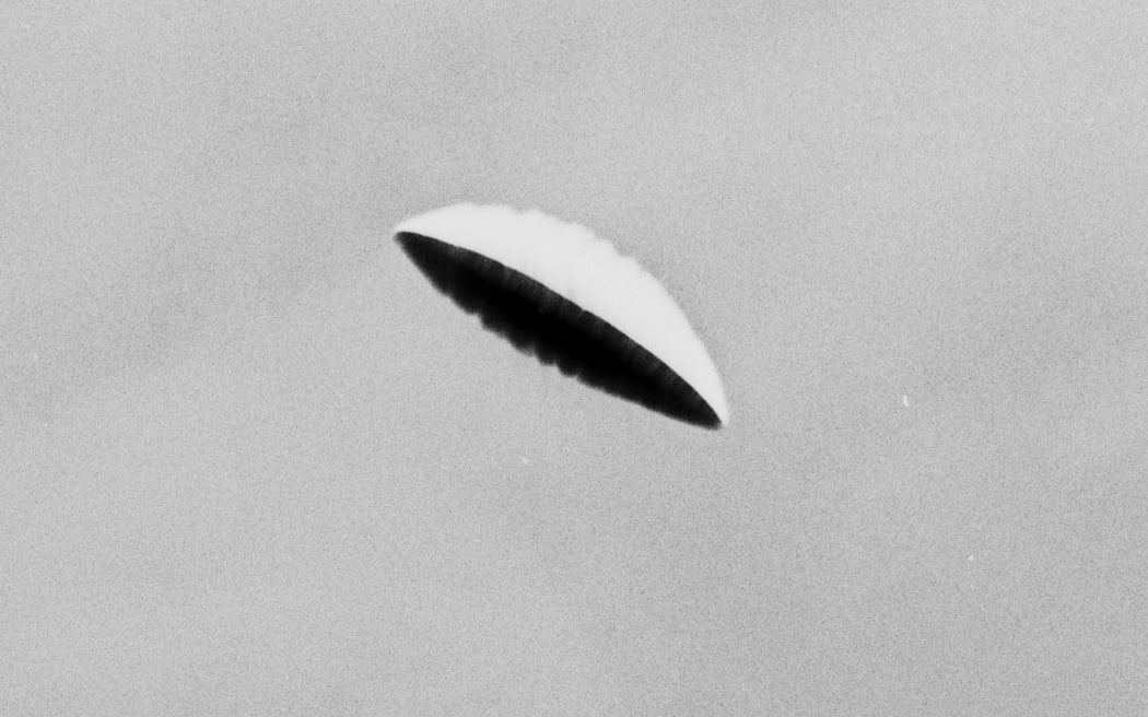 <cptn>01112006 news.
Supplied NZ Navy picture taken onboard HMNZS Royalist on the 7 Febuary 1965 showing an unexplained object (UFO) in the sky.</cptn><dttkn>01/11/2006</dttkn><mgd>167391</mgd><thr>NZ Navy archives</thr><lctn>Wellington</lctn><cpyrght>Copyright to The Dominion Post.  This photograph may not be reproduced, copied or published in any printed or digital form without permission.</cpyrght><lgl></lgl>