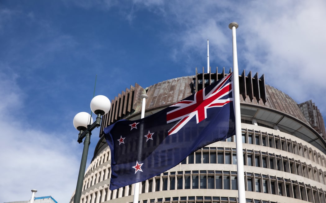 Flags at half mast in front of Parliament