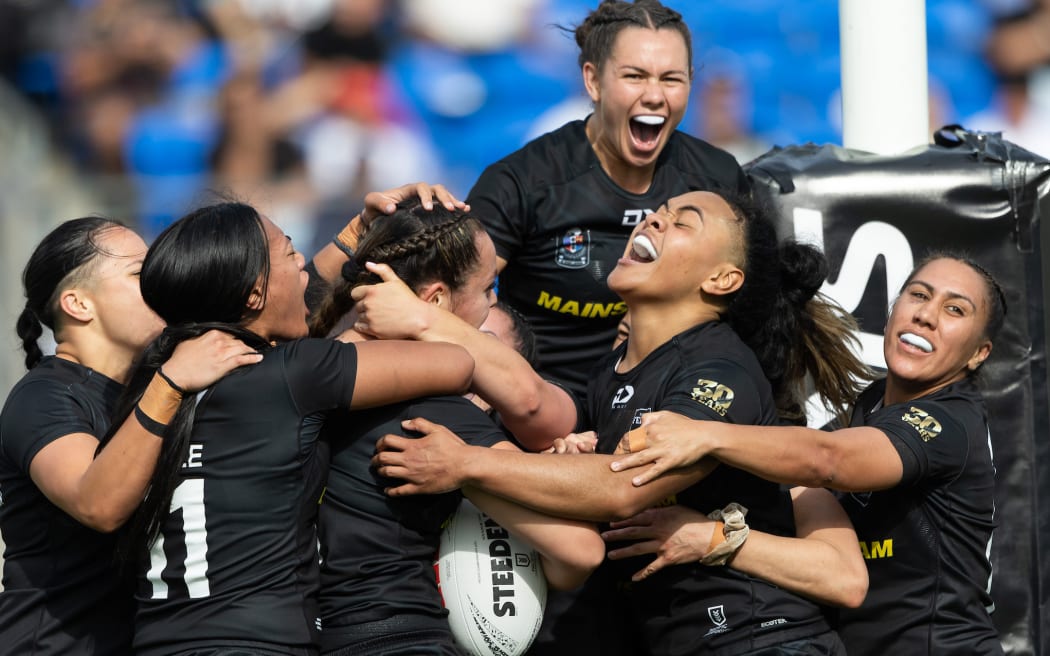 Kiwi Ferns Alexis Tauaneai celebrates with her team mates after scoring a try during the Paciﬁc Championships rugby league test between New Zealand Kiwis v Toa Samoa at Go Media Stadium, Auckland.