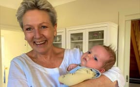 Helen Kerr with her grandchild in Melbourne.