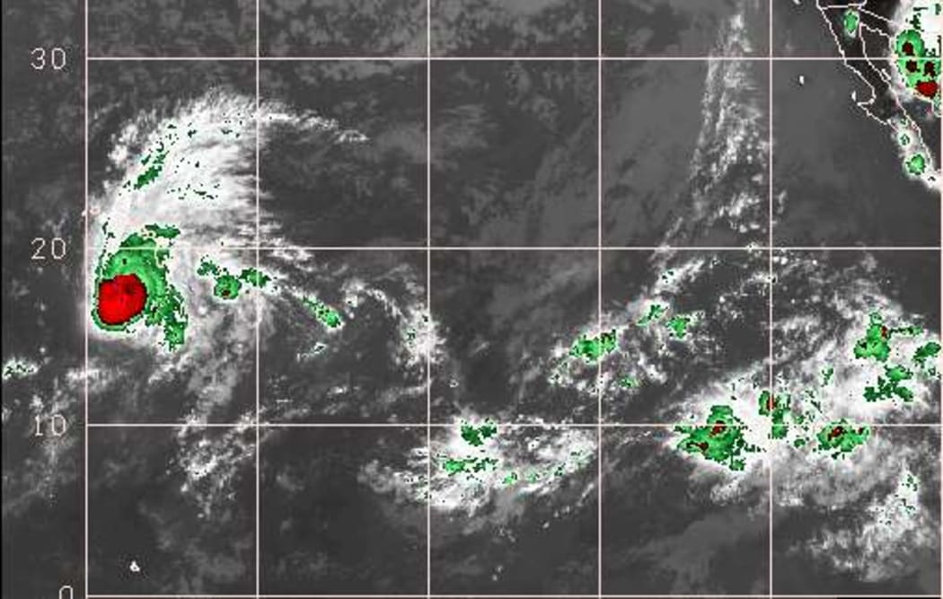A satellite image of Hurricane Lane, now a category three, as it skirts close to the Hawaiian islands.