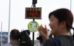 The thermometer shows 42 degrees Celsius in Isesaki City, Gunma Prefecture, Japan, on August 5, 2025.