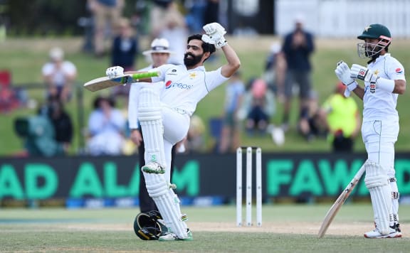 Pakistan's Fawad Alam celebrates his century innings.