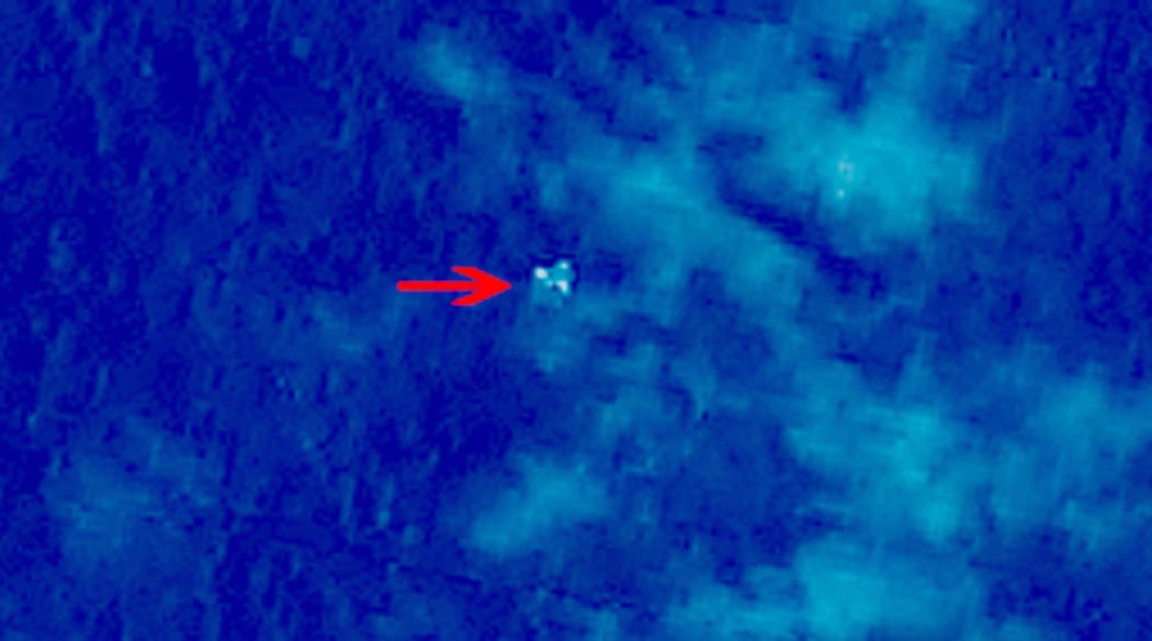 A satellite image taken from space, illustrating objects in a "suspected crash sea area" in the South China Sea on 9 March.