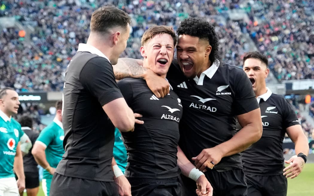 Cam Roigard celebrates scoring against Ireland.