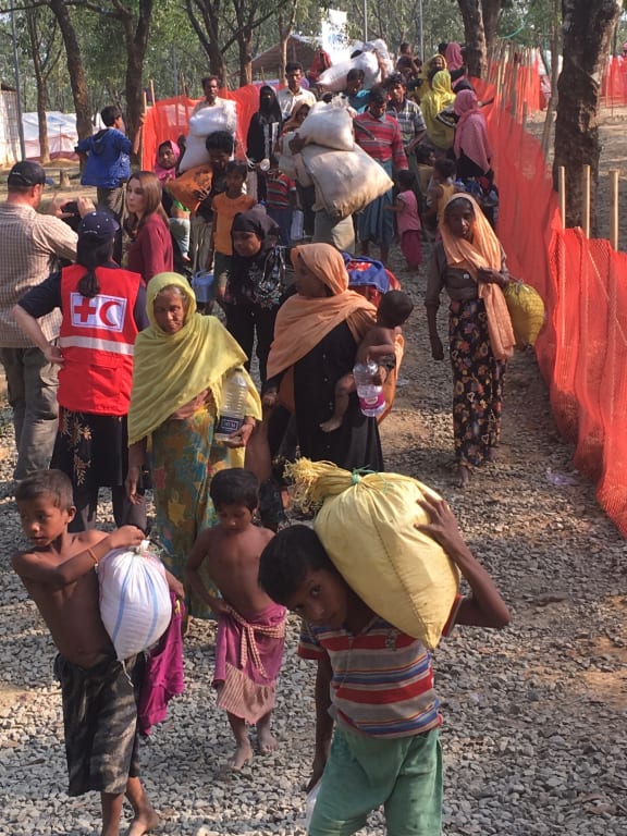 Red Cross mobile medical teams continue to assist new arrivals from Myanmar at the transit camp in Bangladesh, where people are arriving by the thousands.