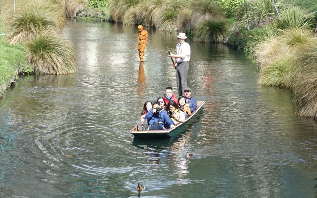 The Anthony Gormley scuplture in the Avon River.