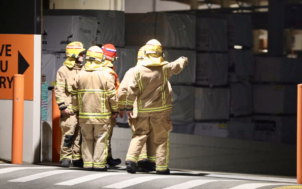 Smoke could be seen from one of the roller doors at Westgate Mitre 10.