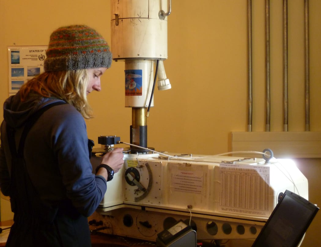 Antarctica NZ technician Nita Smith (2010-11 season) measures ozone levels at Scott Base using a Dobsonmeter.