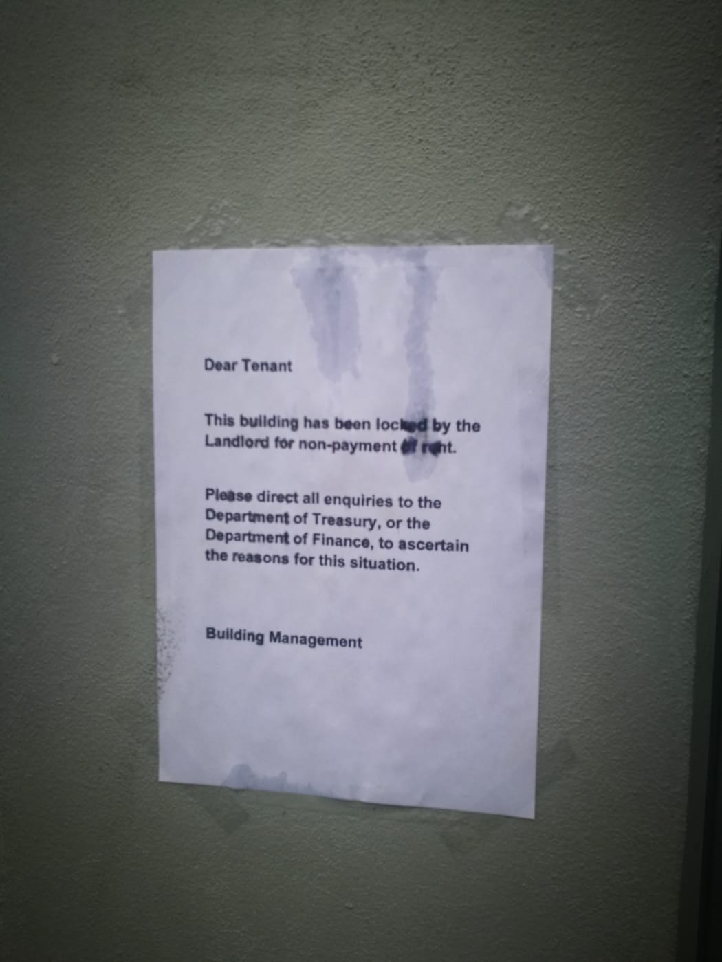 Document notifying PNG building shut down over non payment of rent