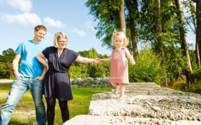 Holly, her partner Dave and their daughter Esther.