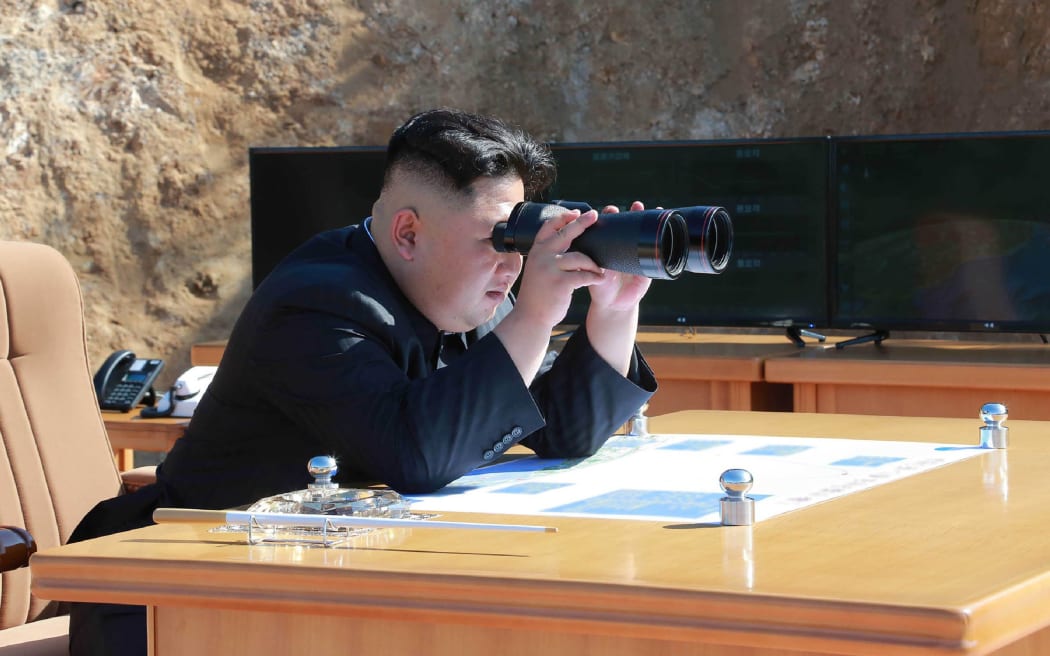 Kim Jong-Un inspecting the test-fire of intercontinental ballistic missile Hwasong-14 at an undisclosed location.