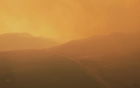 The "apocalyptic twilight" conditions firefighters are working in in British Colombia.