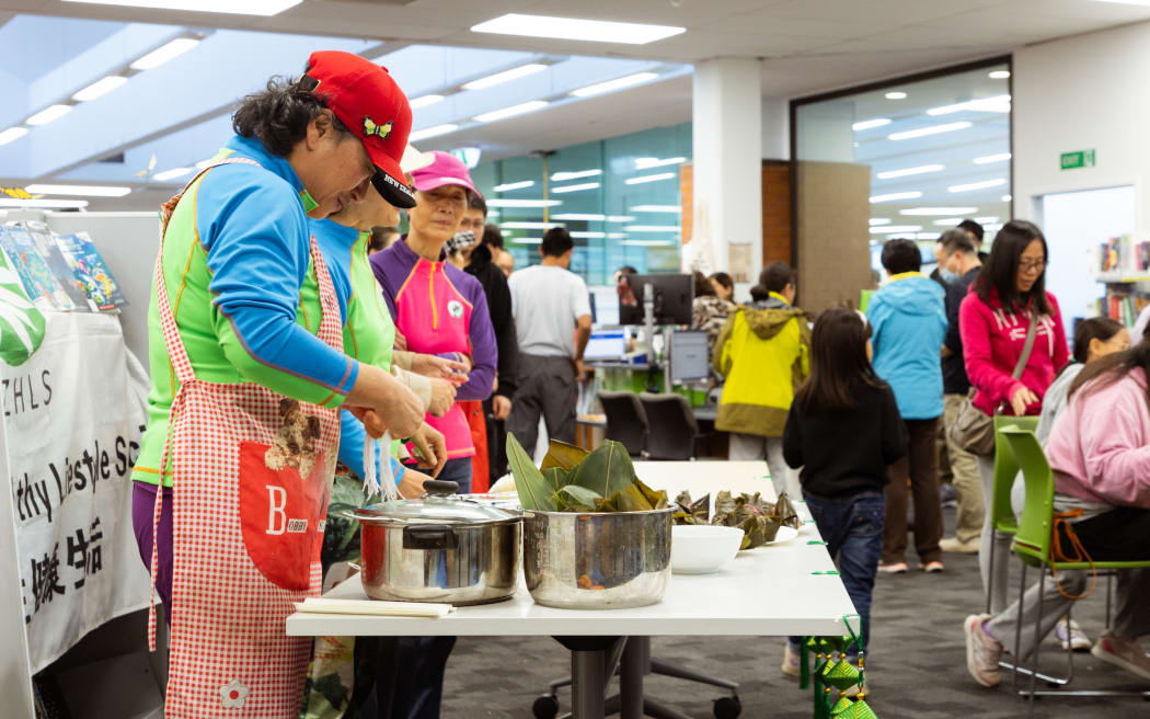 Zongzi Wrapping Workshop Held at Highland Park on May 18 to Celebrate the Chinese Dragon Boat Festival.