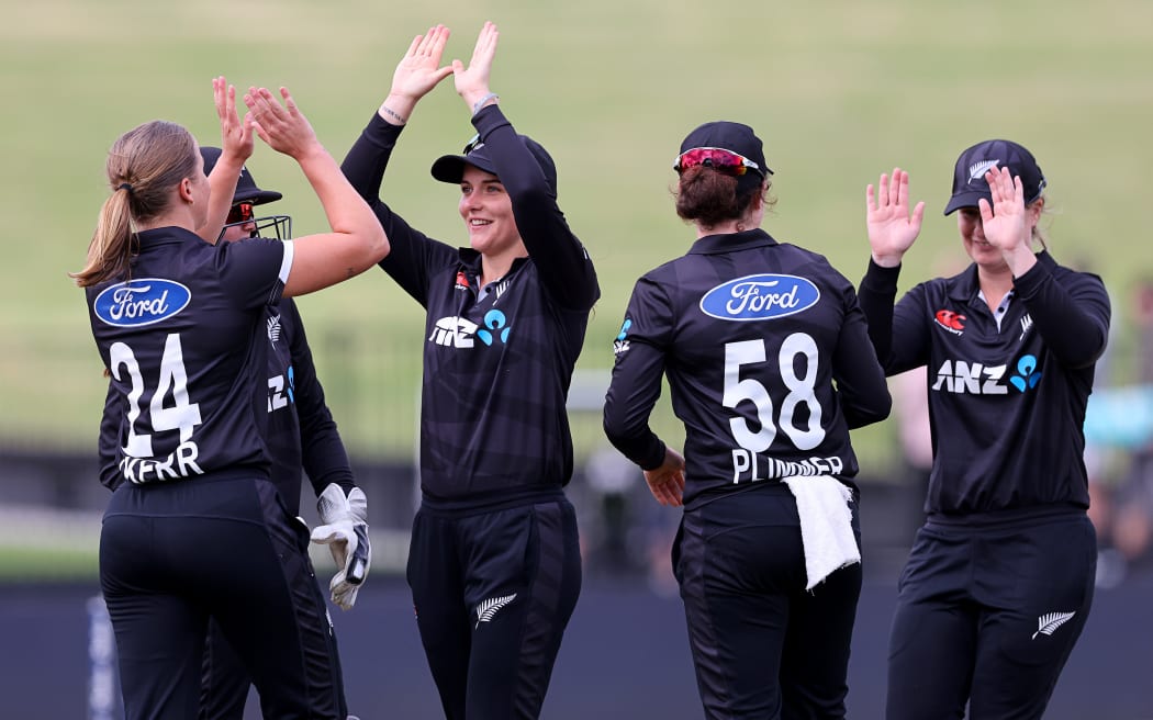 New Zealand celebrate a wicket in the third ODI against at Seddon Park in Hamilton.