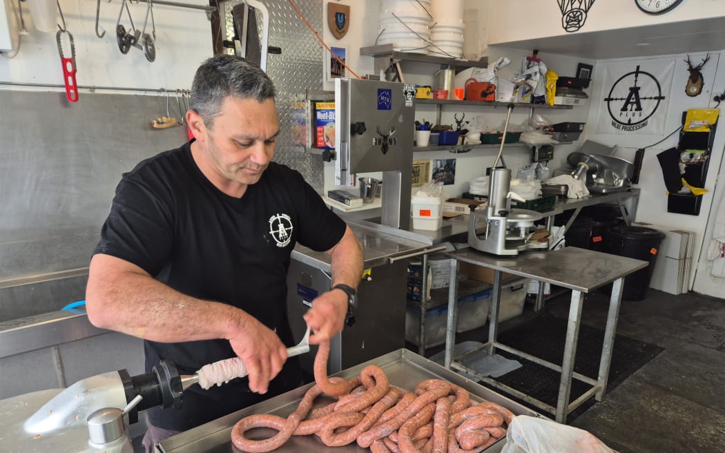AARON POHATU MAKING SAUSAGES