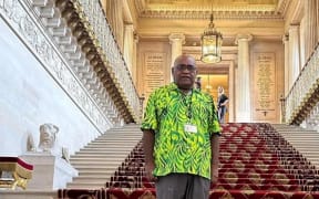 First pro-independence Senator for New Caledonia Robert Xowie sports a Pacific shirt on his inaugural day in the French Upper House in Paris.
