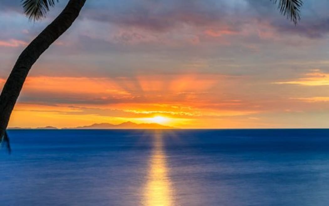 A sunset off Fiji's Denaru Island.