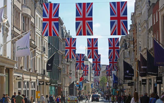 Union flags fly above Bond Street in central London, on April 29, 2023 ahead of the coronation ceremony of Charles III and his wife, Camilla, as King and Queen of the United Kingdom and Commonwealth Realm nations, on May 6, 2023. (Photo by Susannah Ireland / AFP)