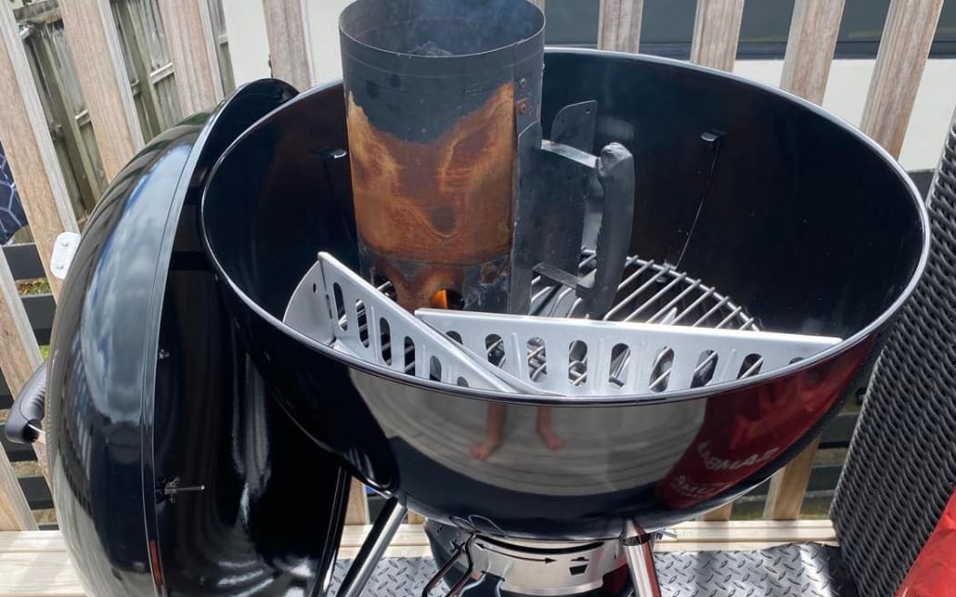 Charcoal heating up to cook food.