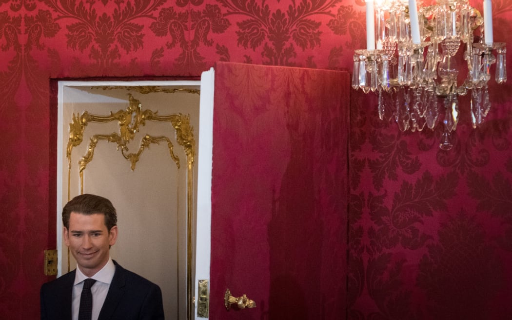 Austrian Chancellor of the conservative People's Party Sebastian Kurz arrives for the swearing-in ceremony of the new Austrian government.
