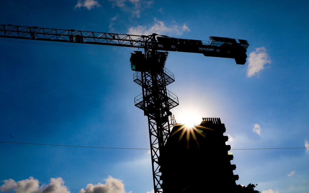 Cranes dot the skyline in Papua New Guinea's bustling capital Port Moresby.