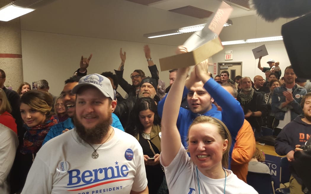 Bernie Sanders supporters trying to entice undecided voters into their corner with boxes of cookies