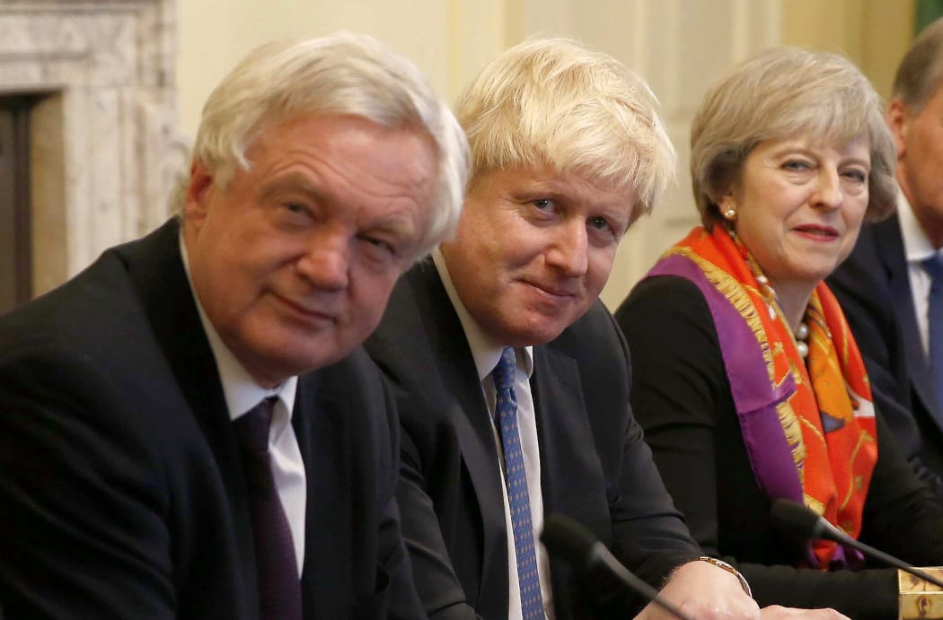 British Prime Minister Theresa May in November 2016 with then-Foreign Secretary Boris Johnson (centre) and Brexit Minister David Davis.