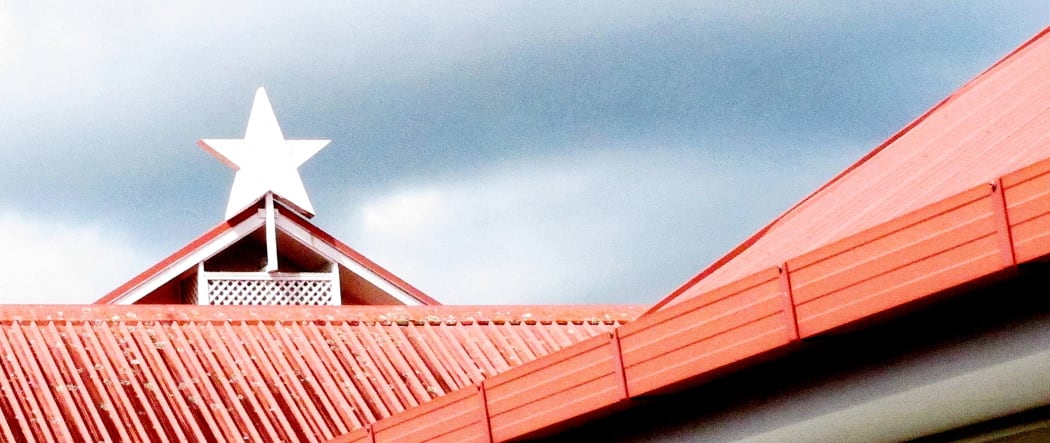 A star on the roof of the church building