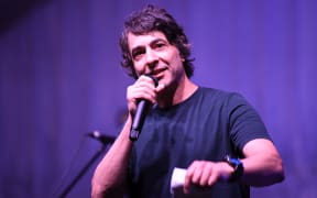 BYRON BAY, AUSTRALIA - OCTOBER 21: Arj Barker performs MC duties at Wild Aid 2023 on October 21, 2023 in Byron Bay, Australia. Proceeds from Wild Aid 2023 will go directly to providing veterinary treatment and care for sick and injured wildlife admitted to the Byron Bay Wildlife Hospital. (Photo by James D. Morgan/Getty Images)