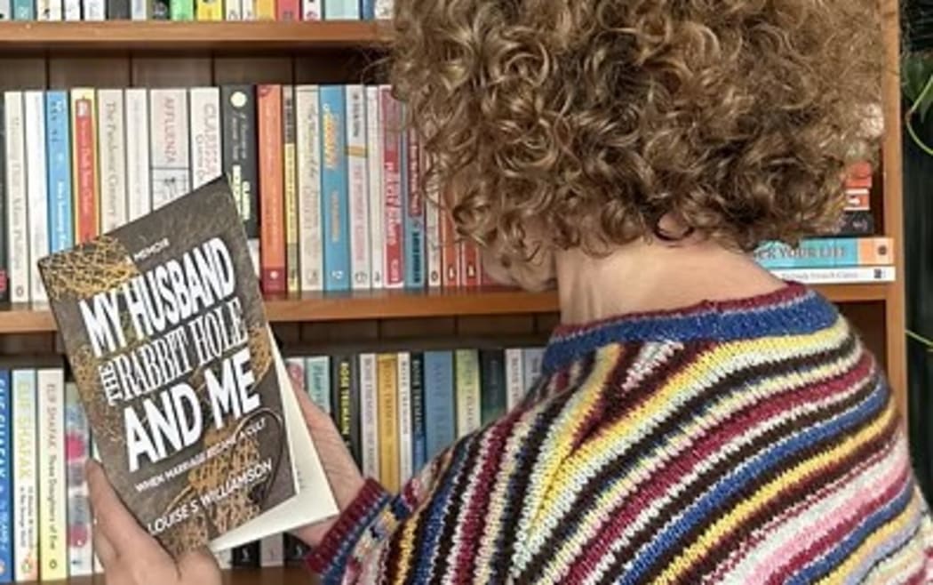 Louise Williamson (pseudonym) has written a memoir about the unnerving experience of watching her husband become consumed by conspiracy theories.