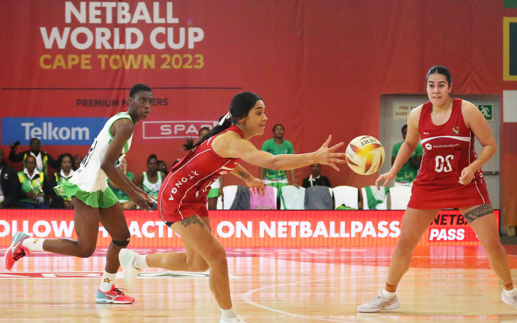 Hulita Veve of Tonga pass to Uneeq Palavi during the Netball World Cup 2023 Pool A match between Tonga and Zimbabwe at CTICC Court 2 on July 30, 2023 in Cape Town, South Africa.