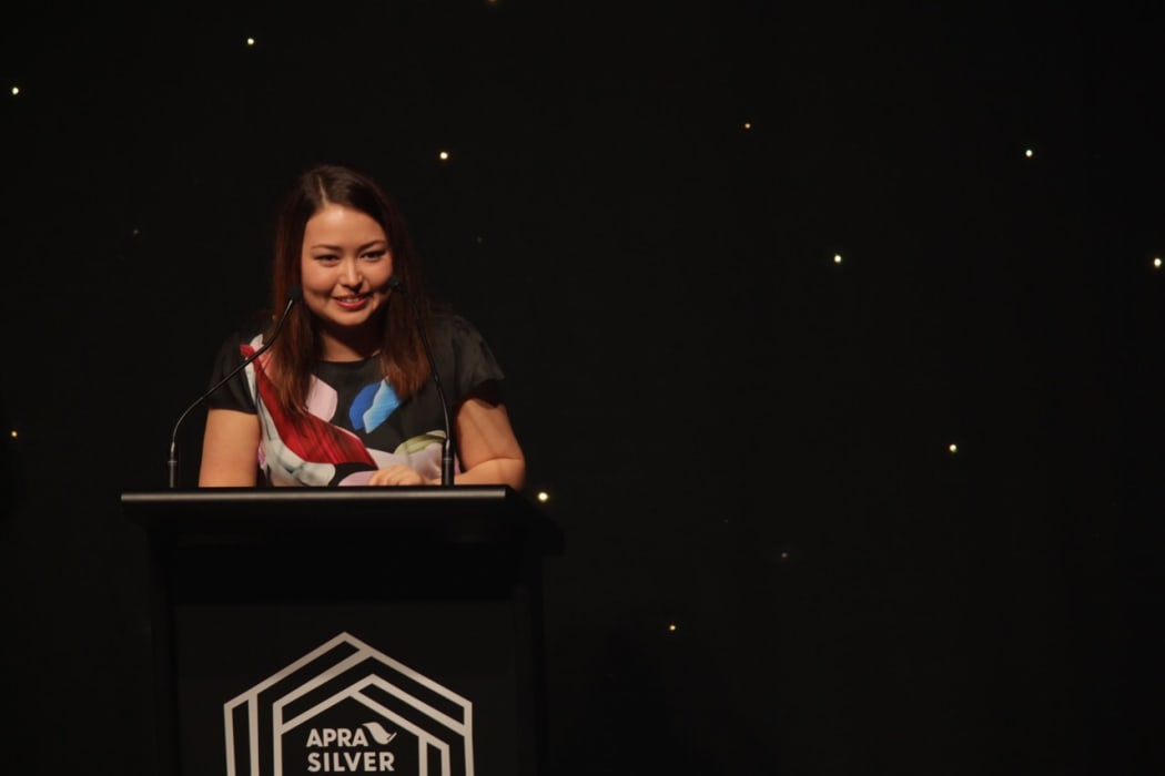 Salina Fisher, the youngest ever winner of the SOUNZ Contemporary Award collects her prize at the APRA Silver Scroll Awards 2016