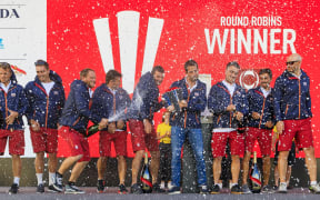 Team UK celebrate finishing top of the America's Cup Challenger Selection Series round robin.