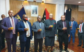 PNG Prime Minister James Marape with the Governor General,Bob Dadae, and part of his reshuffled Cabinet