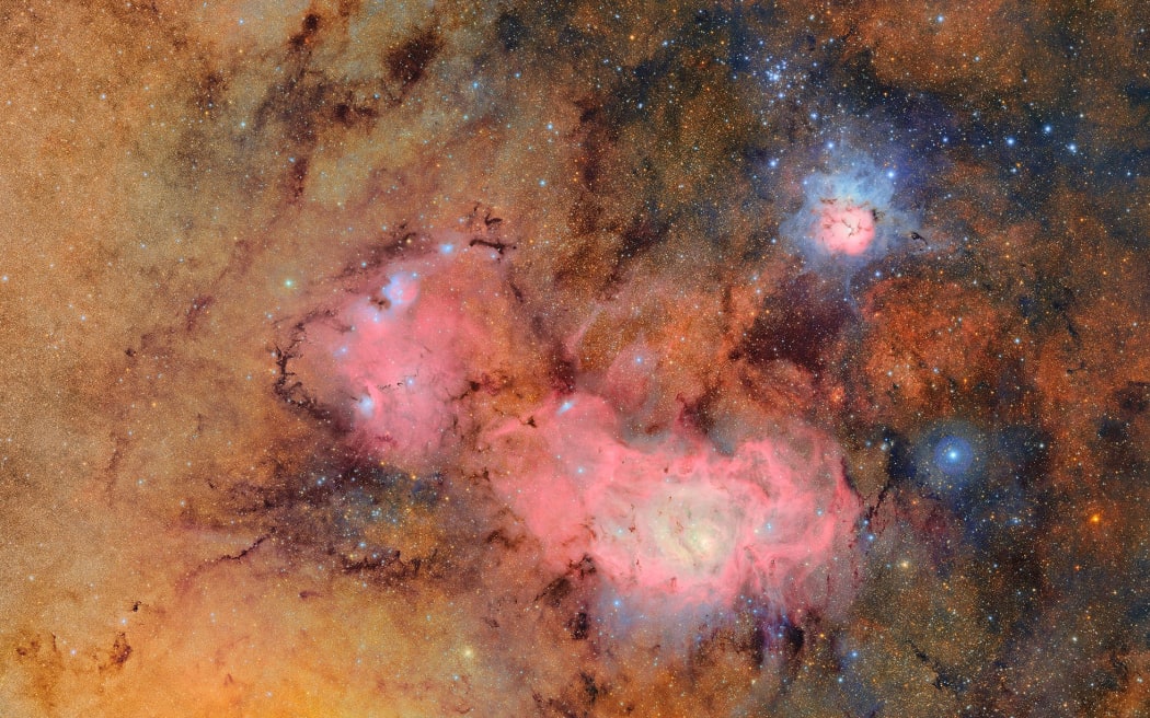 This composite image combines 678 separate images to show faint details like clouds of gas and dust in the Trifid nebula (top right) and the Lagoon nebula.
Mandatory Credit:	NSF-DOE Vera C. Rubin Observatory via CNN Newsource