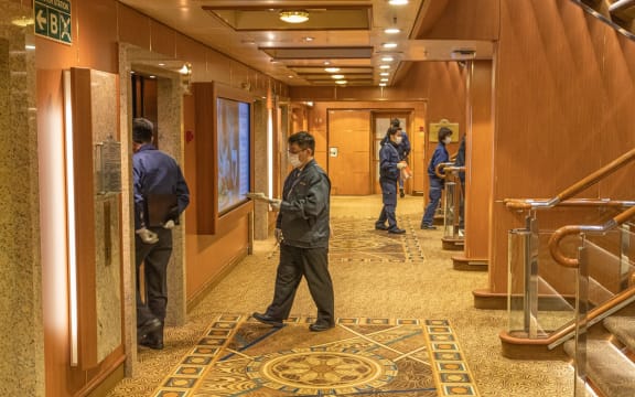 Health officials on board the Diamond Princess cruise ship.