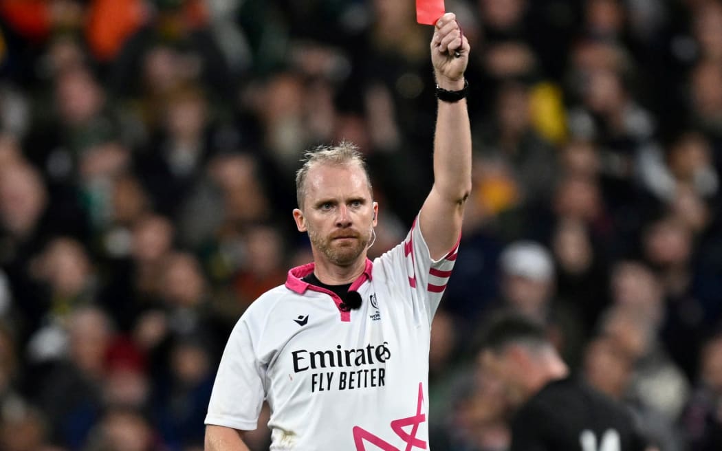 Match referee Wayne Barnes shows a red card to Sam Cane (captain) of New Zealand. Rugby World Cup France 2023, New Zealand All Blacks v South Africa FInal match at Stade de France, Saint-Denis, France on Saturday 29 October 2023. Photo credit: Andrew Cornaga / www.photosport.nz