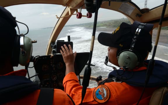 An Indonesian rescue team searching for the missing Japanese tourists.