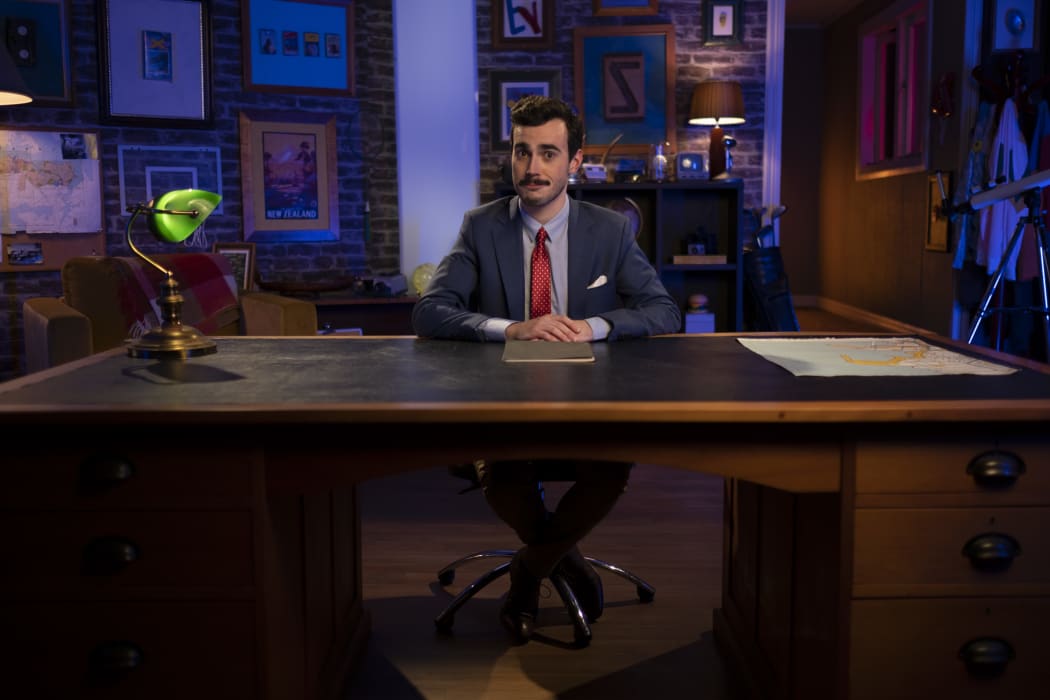 Robbie Nicol. The White Man Behind A Desk.