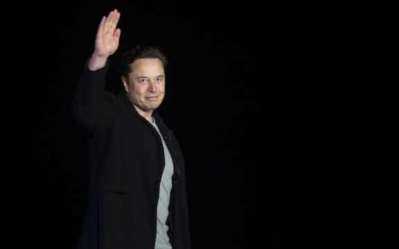 (FILES) In this file photo taken on February 10, 2022 Elon Musk gestures as he speaks during a press conference at SpaceX's Starbase facility near Boca Chica Village in South Texas. - Twitter suspended December 15, 2022, the accounts of more than a half-dozen journalists who had been writing about the company and its new owner Elon Musk. Some of the journalists had been tweeting about Twitter shutting down an @ElonJet account that tracked flights of the billionaire's private jet and about versions of that account hosted at other social networks. (Photo by JIM WATSON / AFP)