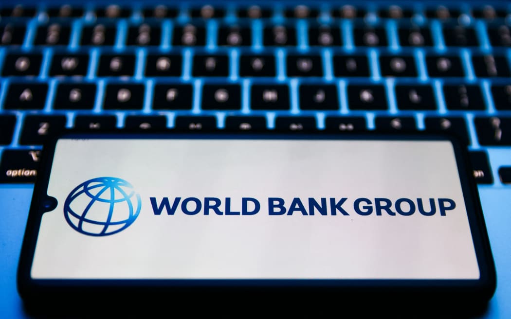 World Bank Group logo is displayed on a mobile phone screen for illustration photo. Krakow, Poland on 2 February 2023.