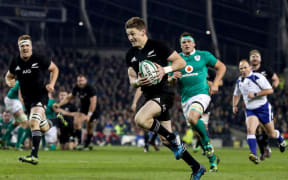 All Blacks player Beauden Barrett smiles on his way to scoring a try against Ireland in Dublin. 20/11/2016