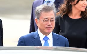South Korea's President Moon Jae-in is pictured upon arrival at Ezeiza International airport in Buenos Aires province, on November 29, 2018. - Global leaders gather in the Argentine capital for a two-day G20 summit beginning on Friday. (Photo by MARTIN BERNETTI / AFP)
