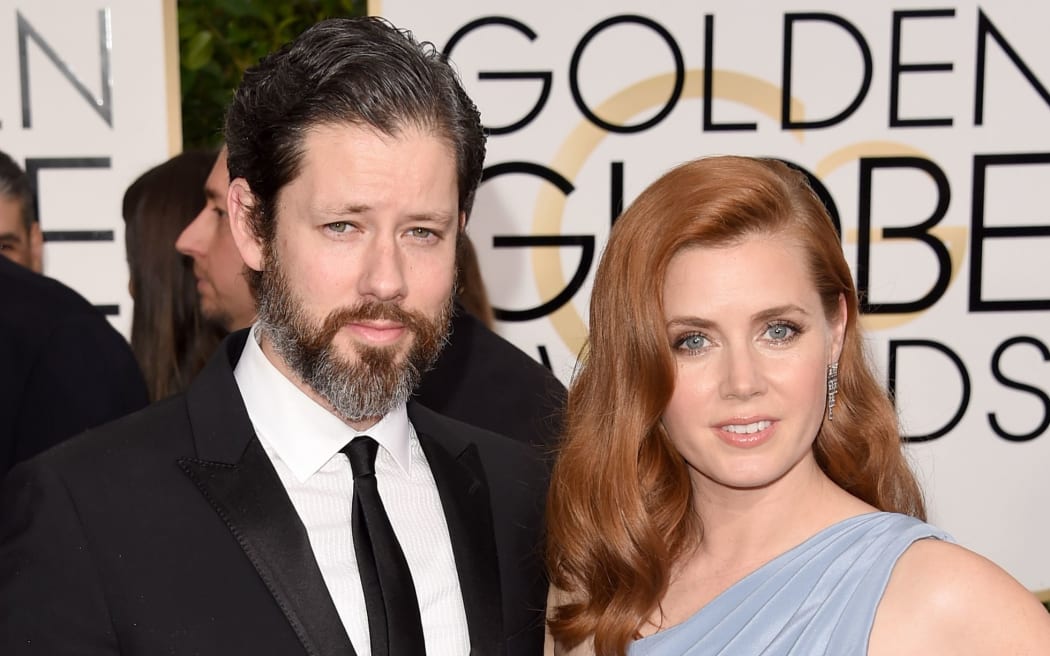 Actors Darren Le Gallo and Amy Adams attend the Golden Globes.