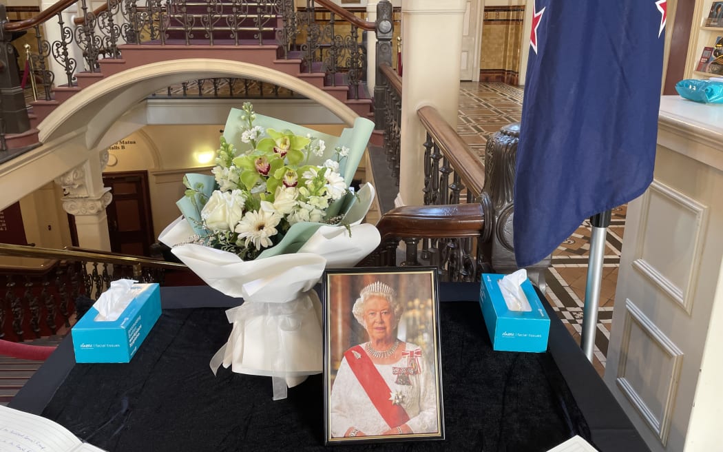 A memorial book for Queen Elizabeth II is laid out at Auckland Town Hall.