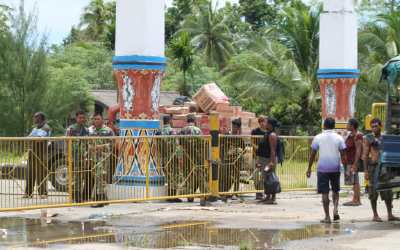 Indonesian military guard the border with Papua New Guinea at Wutung,