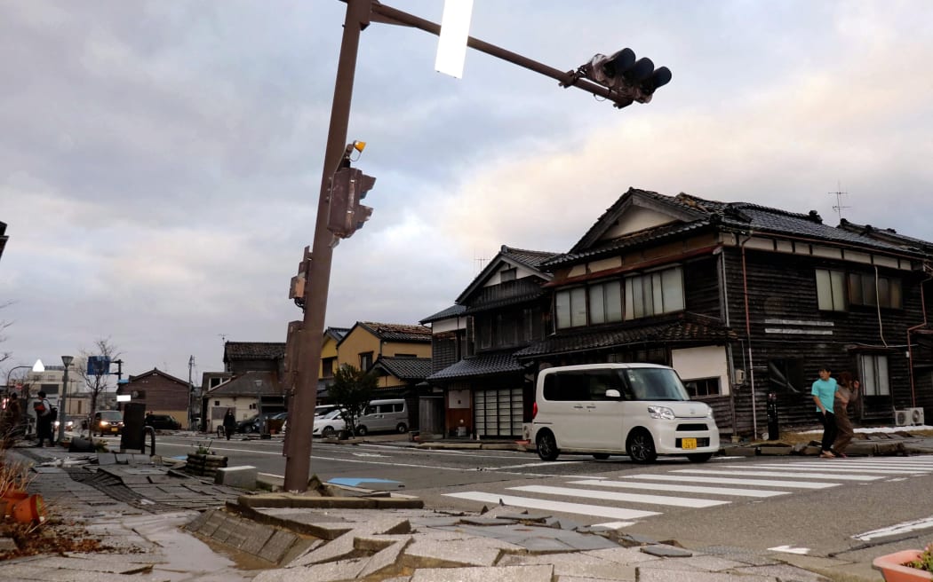 A pavement is broken after a massive magnitude 7.4 earthquake in Wajima City, Ishikawa Prefecture, Japan, on 1 January, 2024.
